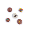  Our  handmade chocolates, featuring Milk, White, and Dark Chocolate Birthday Cake Bomb, M&M Square, Seafoam Dome, Cookies and Cream Cluster, and Potato Chip Cluster.