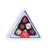 Image of Rocky Mountain Chocolate's signature peak box containing five pieces of handmade chocolates in Milk, Dark, Red Velvet, and Maple flavors.
